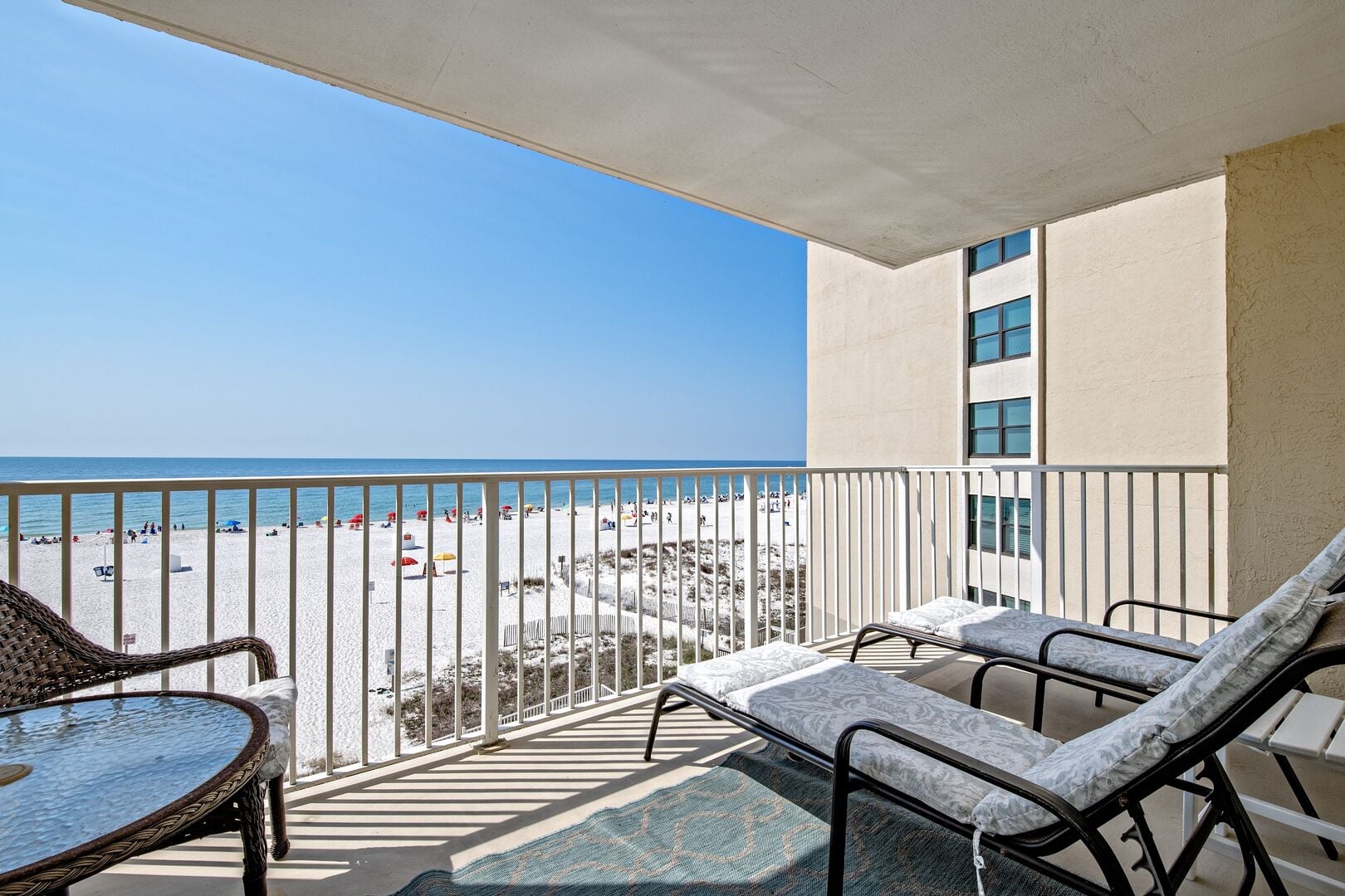 Balcony with loungers and Gulf view at Clearwater condos in Gulf Shores Alabama