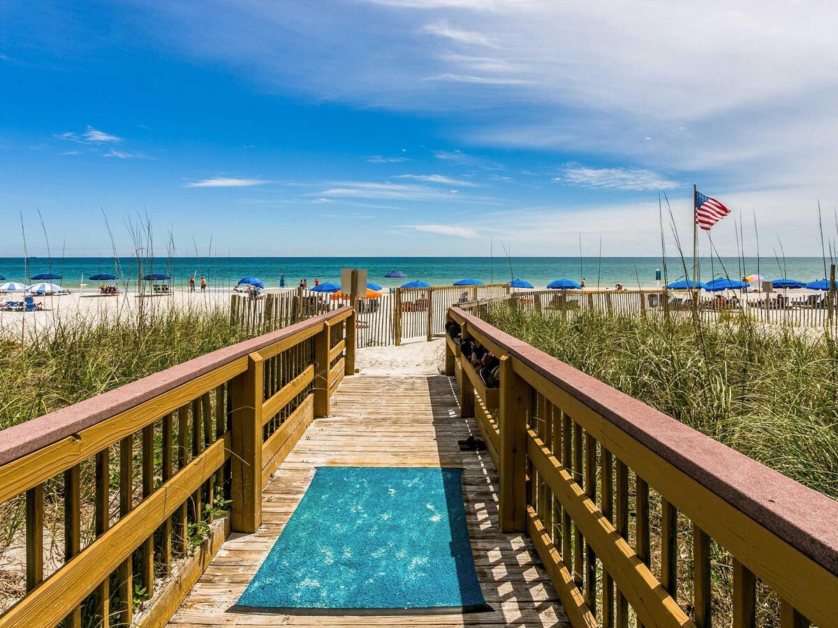 Beach boardwalk at Crystal Shores West beachfront condos in Gulf Shores Alabama