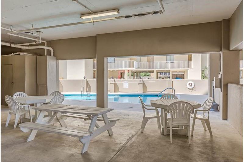 Covered picnic area by the pool at Gulf House in Gulf Shores, Alabama