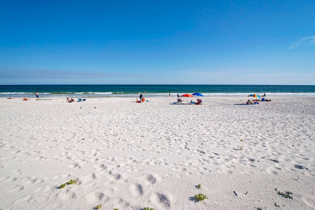 White sand beach in front of Gulf House in Gulf Shores, Alabama