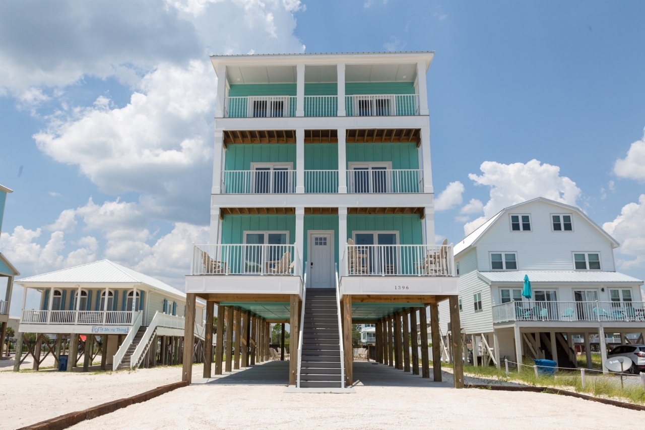 Tall beach house with balconies at Absolutely Beachy in Gulf Shores, Alabama