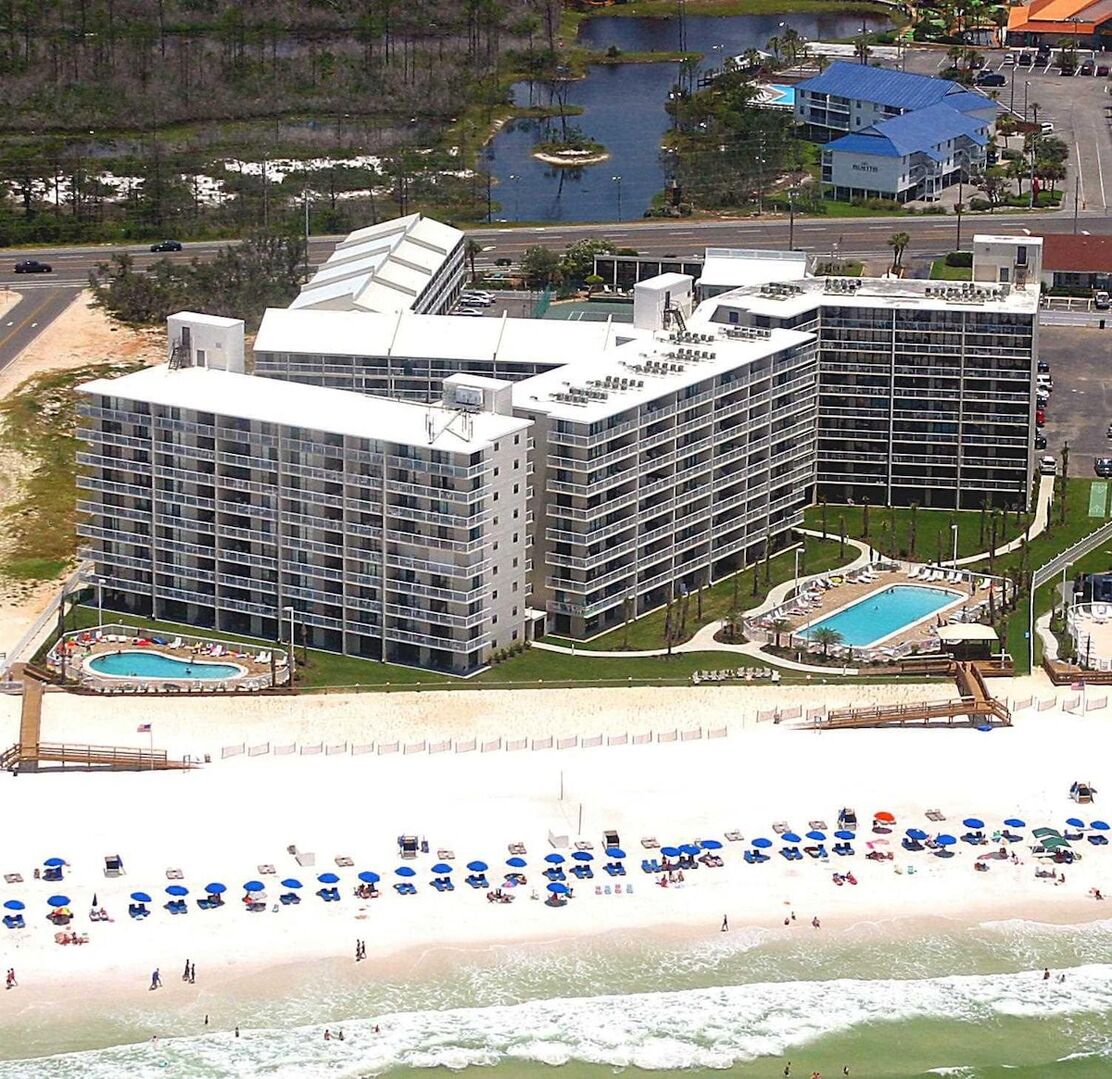 Aerial view of Seaside Beach & Racquet Club in Orange Beach, Alabama