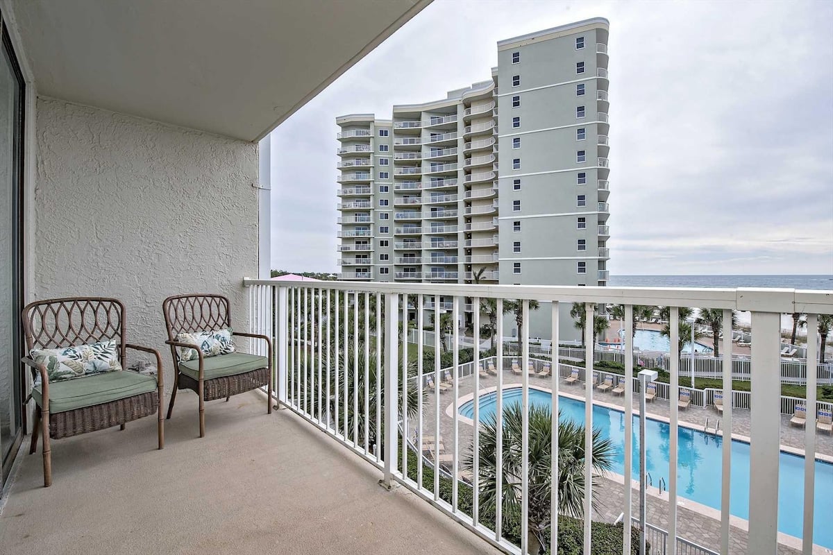 Balcony view of the pool and beach at Seaside Beach & Racquet Club in Orange Beach, Alabama