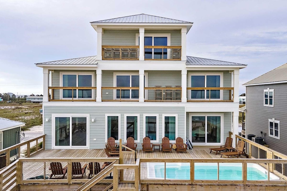 Beach house with pool and back deck at DOLO in Fort Morgan, Alabama