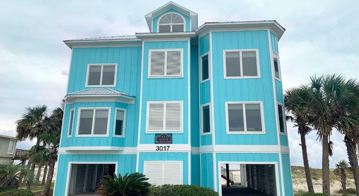 Turquoise beach house at Four SeaSuns in Gulf Shores, Alabama