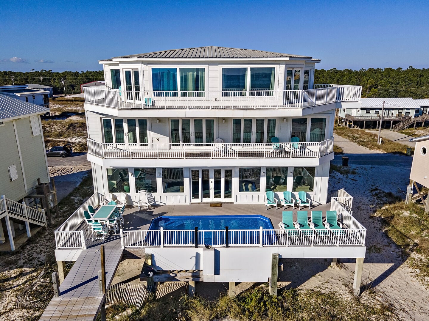 Beach house with private pool and decks at Jewell of the Gulf in Fort Morgan, Alabama