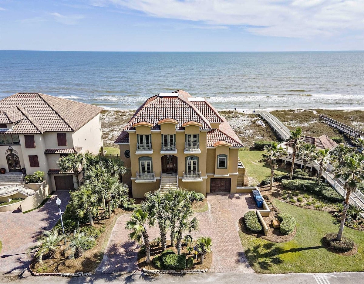 Aerial view of Mediterranean style house near the Gulf at Laguna Key Taj Mahal in Gulf Shores, Alabama