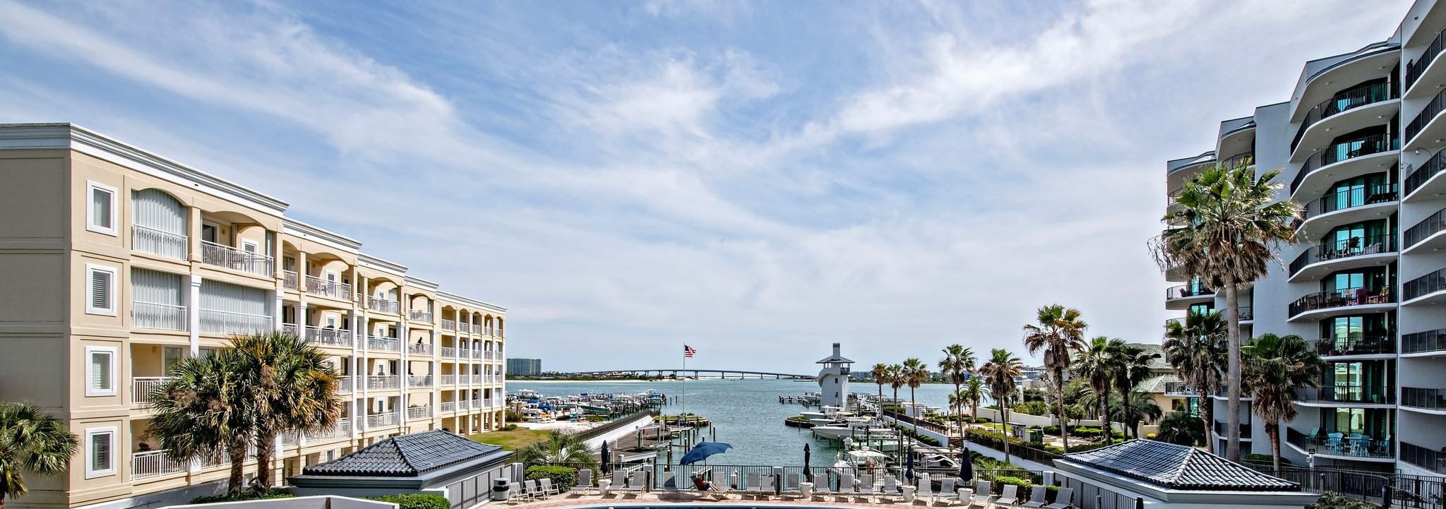 Marina, lighthouse and bay seen from a condo balcony at Lighthouse on the Bay, formerly Phoenix on the Bay II, in Orange Beach, Alabama