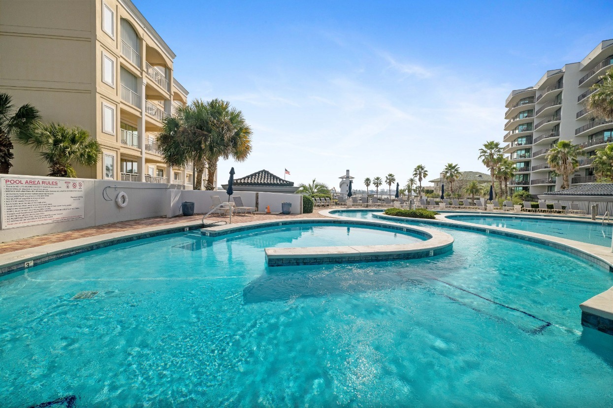 Outdoor pool with island at Lighthouse on the Bay in Orange Beach, Alabama