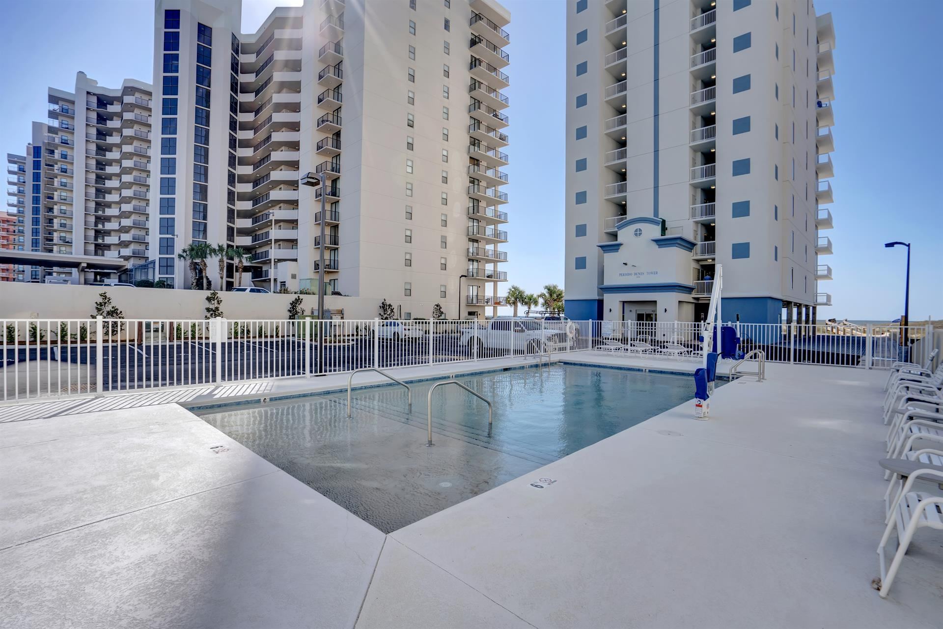 Outdoor pool deck at Perdido Dunes Tower in Orange Beach, Alabama