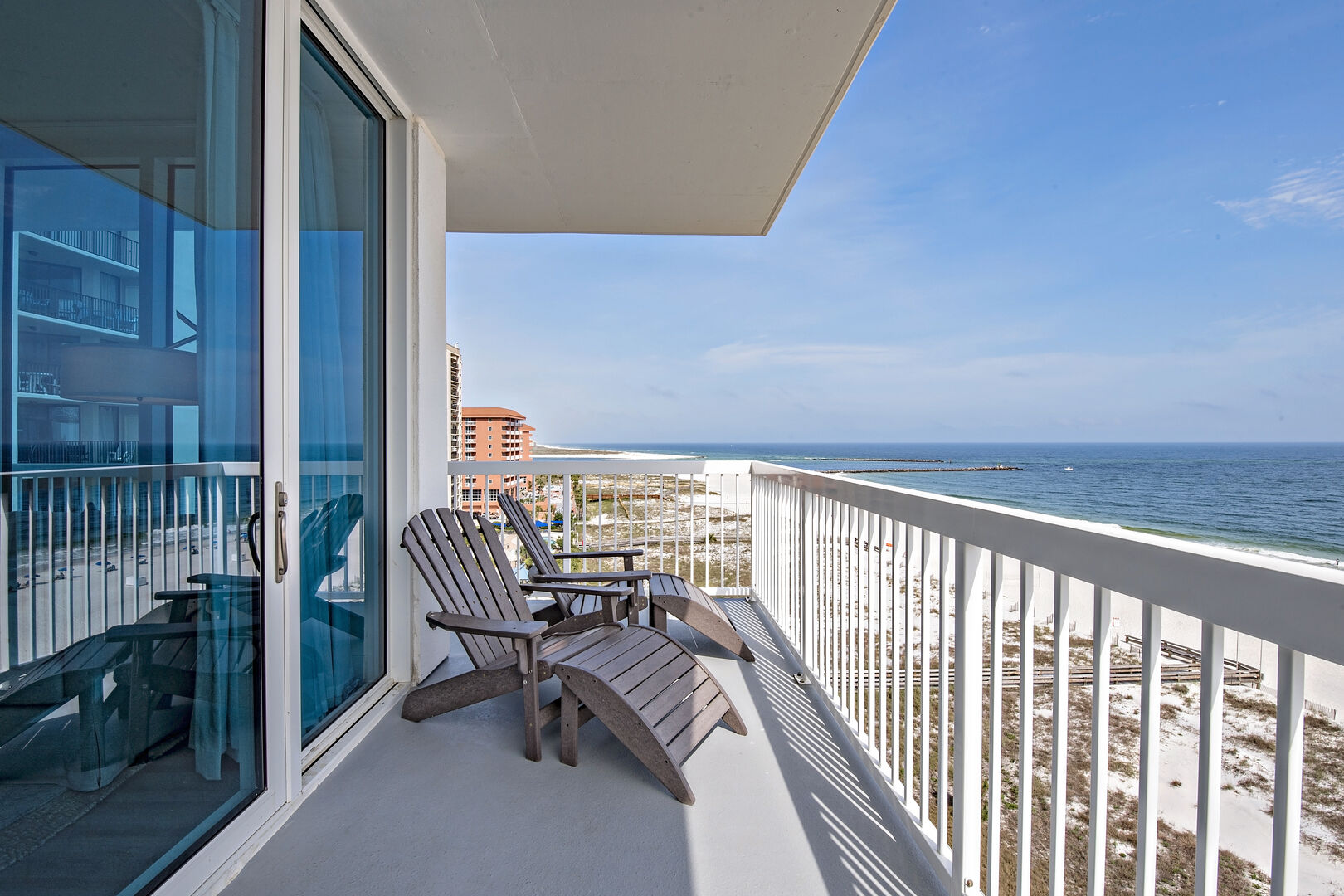 Balcony chairs with a Gulf view at Perdido Dunes Tower in Orange Beach, Alabama
