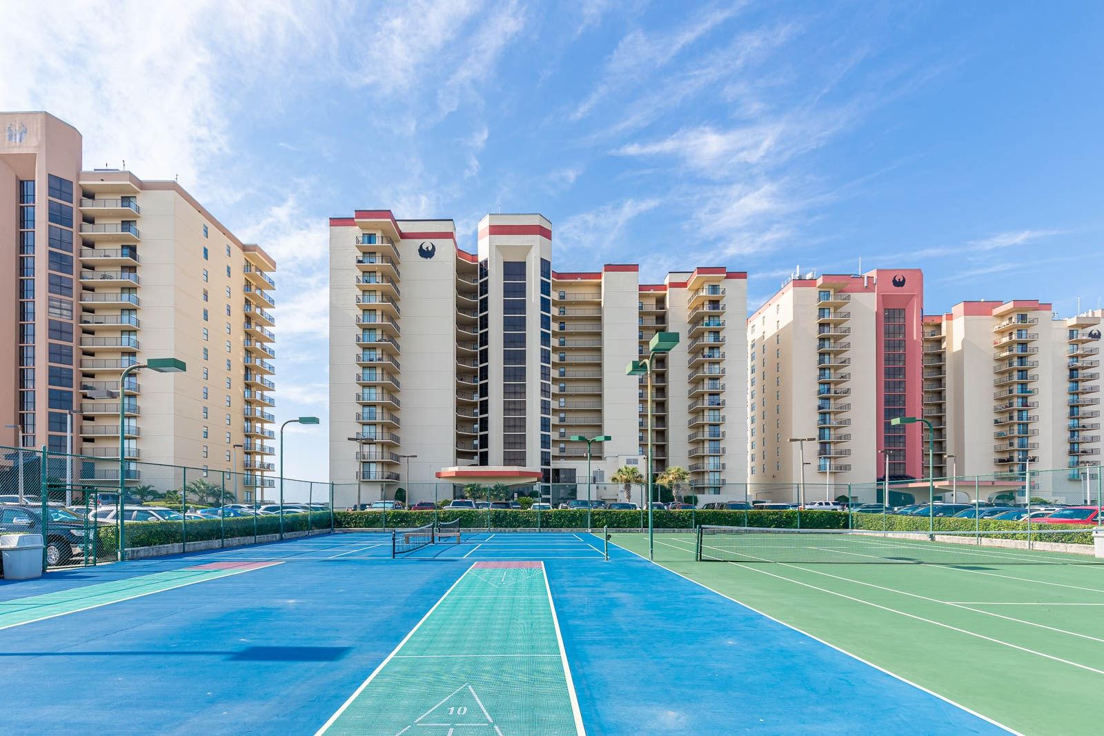 Condo towers of Phoenix III (Phoenix 3) over the tennis courts in Orange Beach, Alabama
