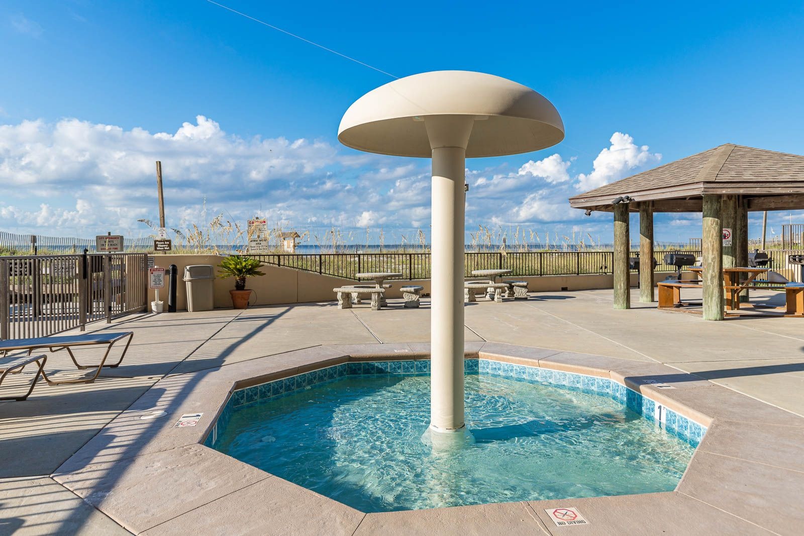 Kiddie pool with a mushroom fountain at Phoenix IV (Phoenix 4) in Orange Beach, Alabama