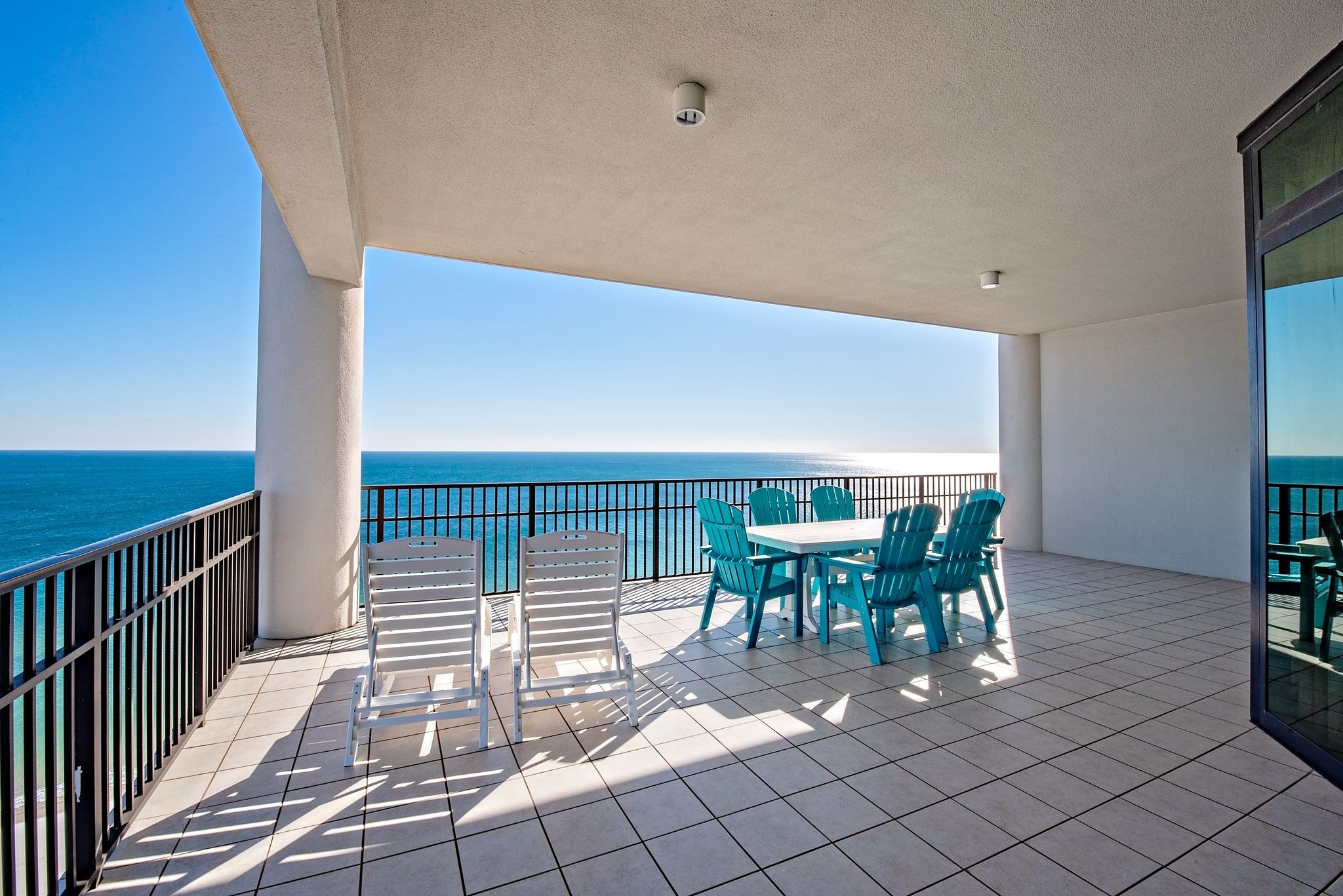Balcony dining table in unit 1711 at Phoenix Oasis in Orange Beach, Alabama