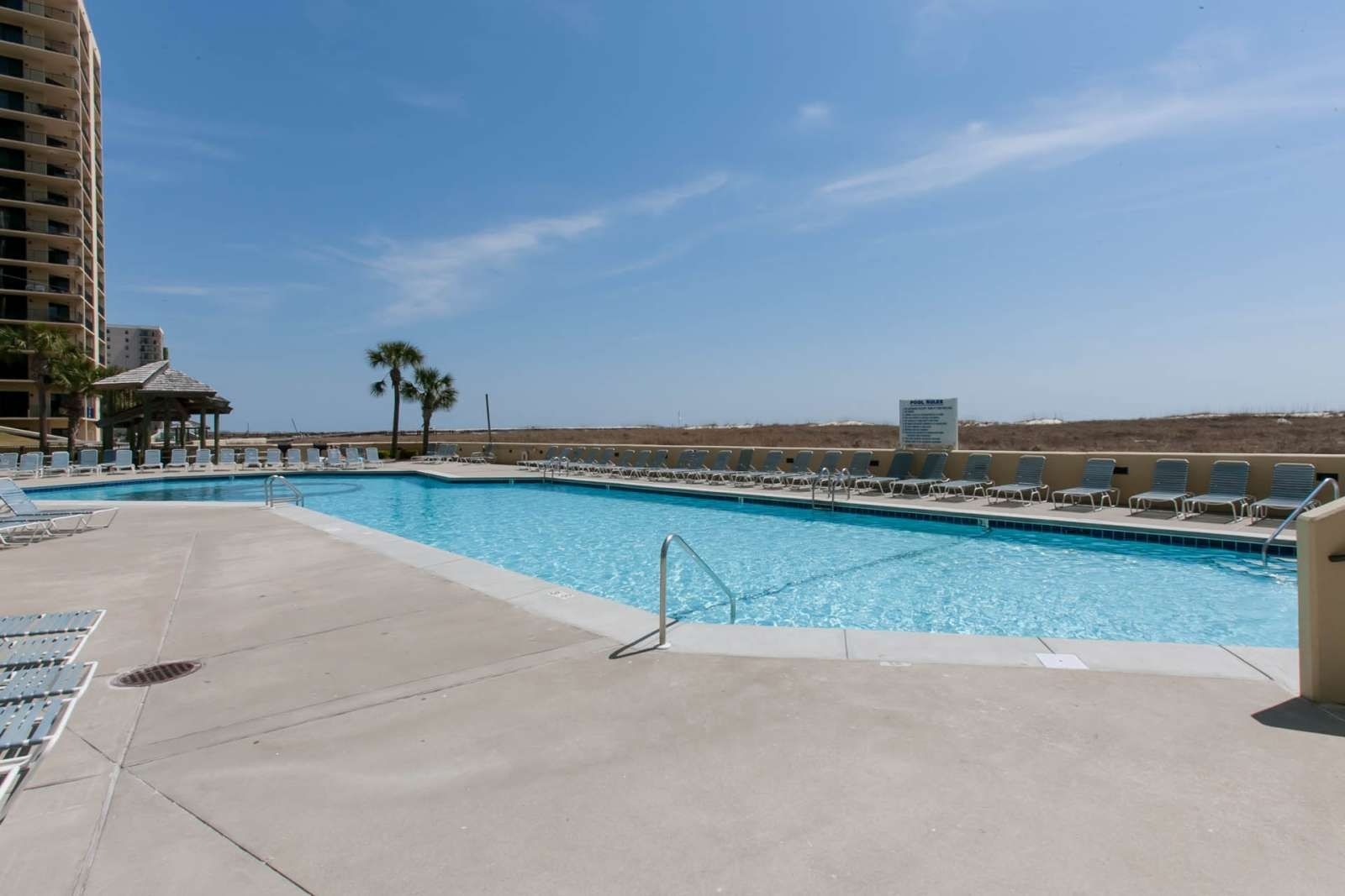 Large Gulf-front outdoor pool at Phoenix VI in Orange Beach, Alabama