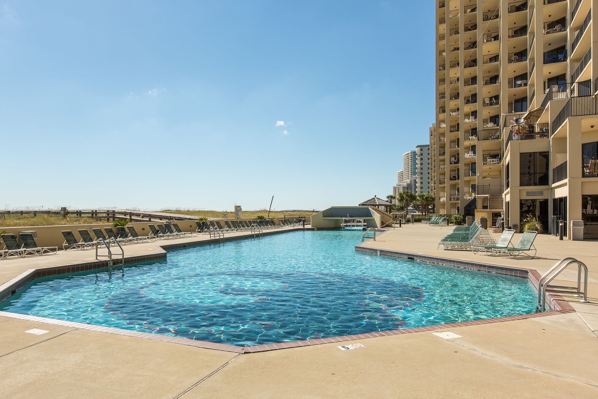 Gulf-front outdoor pool at Phoenix VII in Orange Beach, Alabama