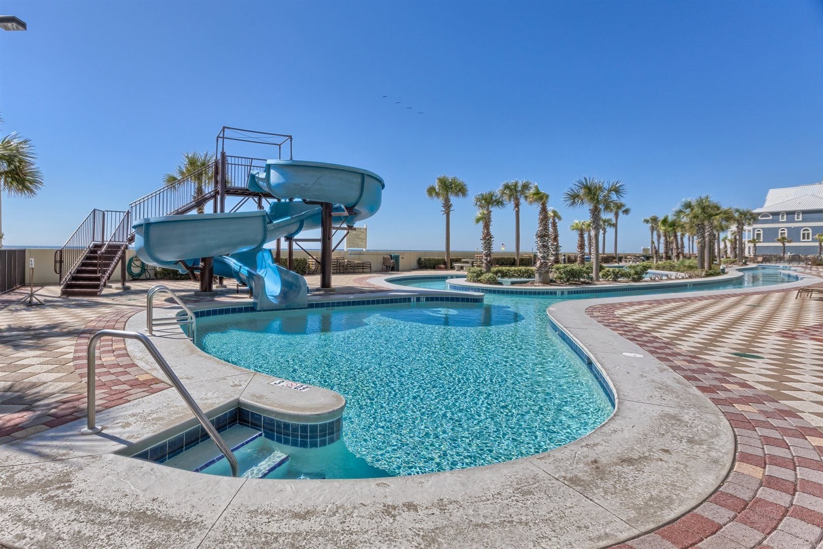Water slide and outdoor pool at Phoenix West in Orange Beach, Alabama